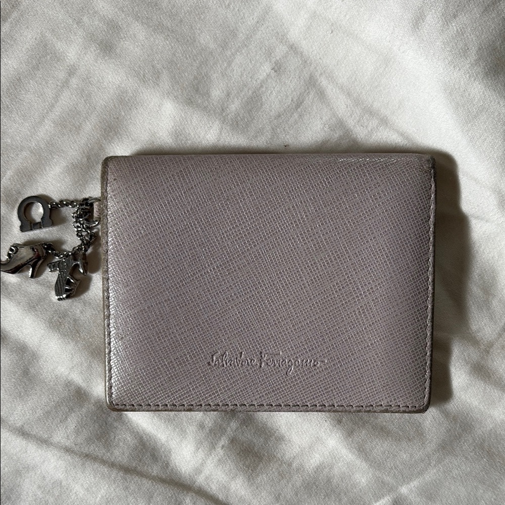 Authentic Salvatore Ferragamo lilac colored Leather Wallet with Charm